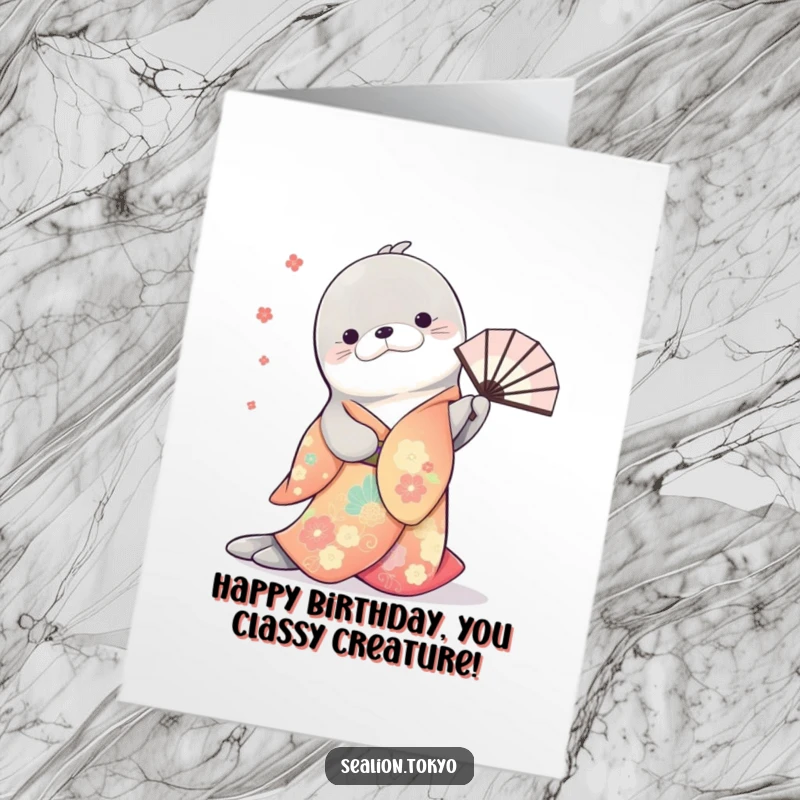 Free Printable Birthday Card: Sea lion in colorful kimono bowing gracefully with a twirling fan